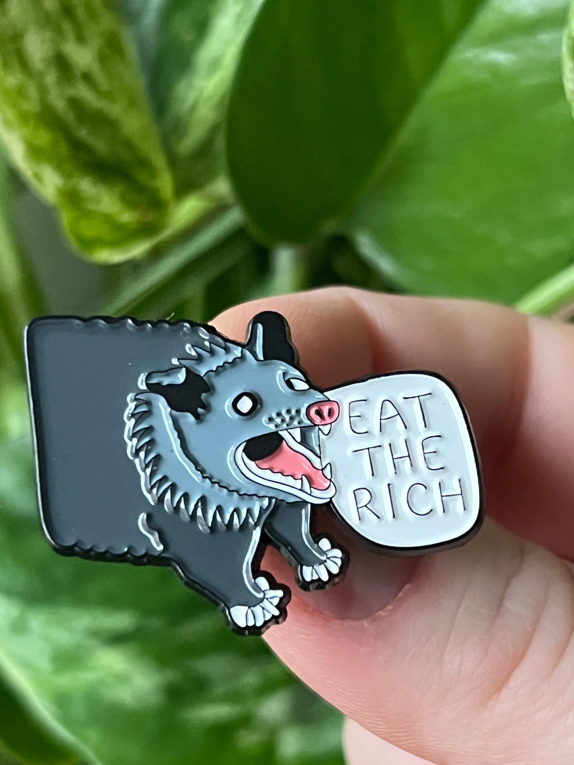 eat the rich screaming possum enamel pin