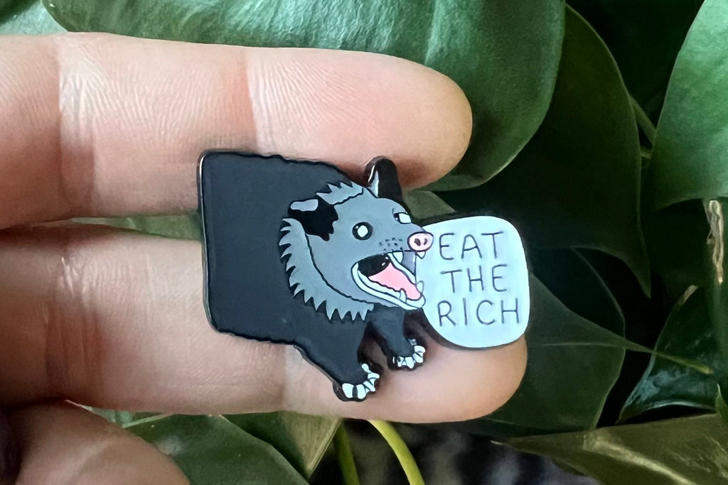 eat the rich screaming possum enamel pin