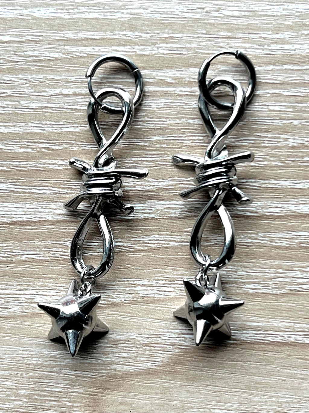 spiked barbed wire huggie earrings gothic morning star earrings punk jewelry goth accessories stainless steel hypoallergenic silver hoops