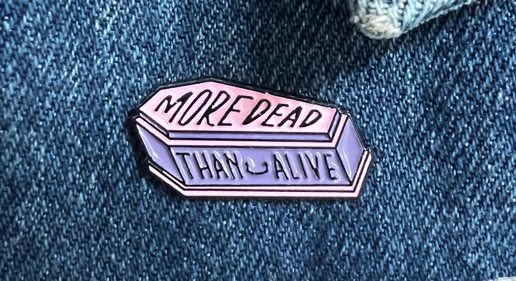 More Dead Than Alive coffin enamel pin