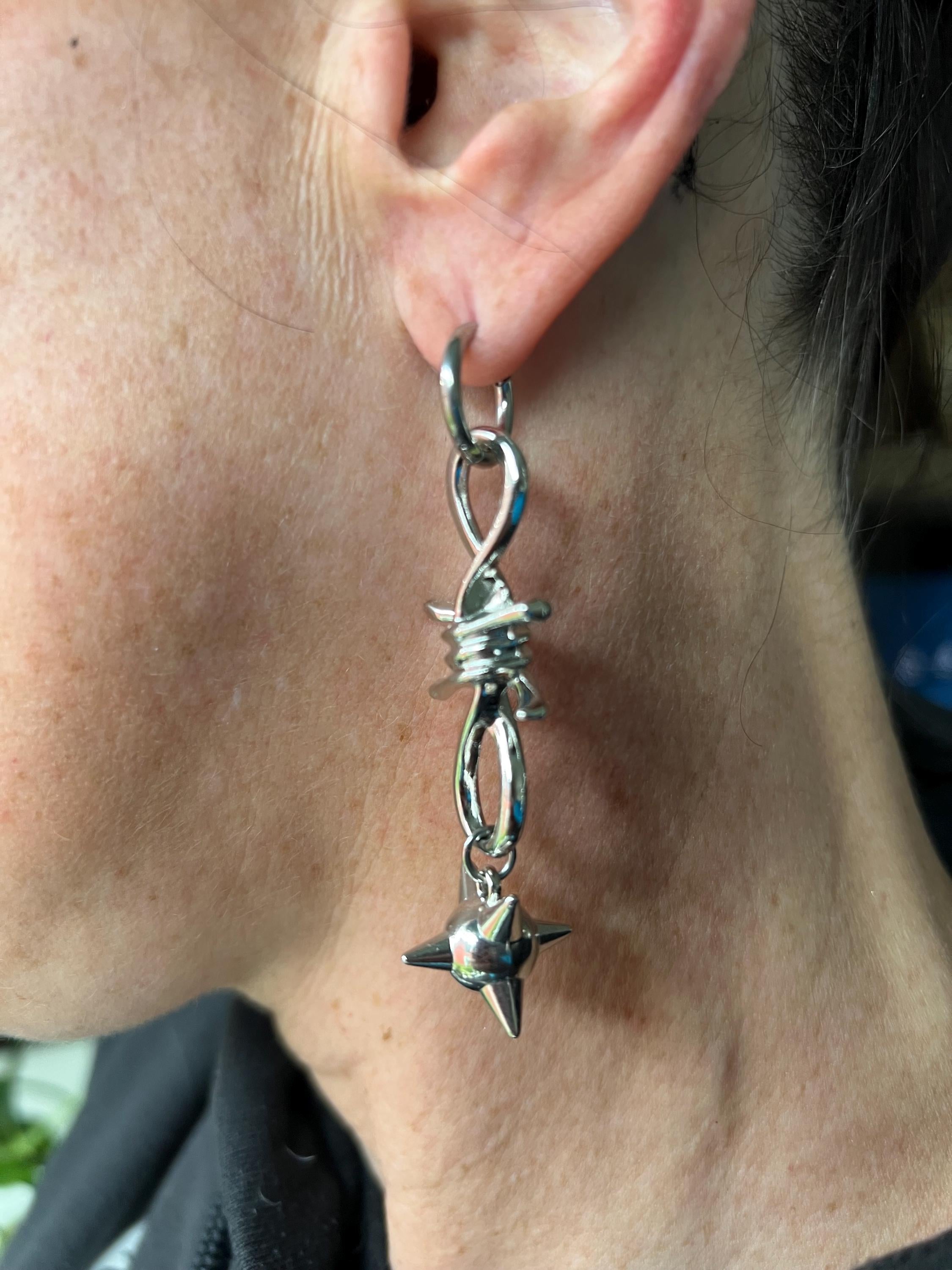 spiked barbed wire huggie earrings gothic morning star earrings punk jewelry goth accessories stainless steel hypoallergenic silver hoops