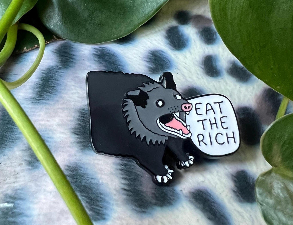 eat the rich screaming possum enamel pin
