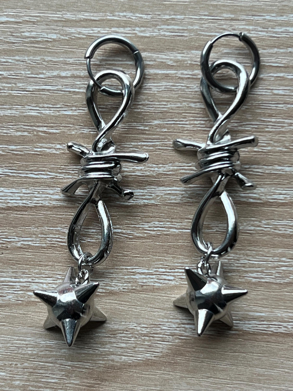 spiked barbed wire huggie earrings gothic morning star earrings punk jewelry goth accessories stainless steel hypoallergenic silver hoops