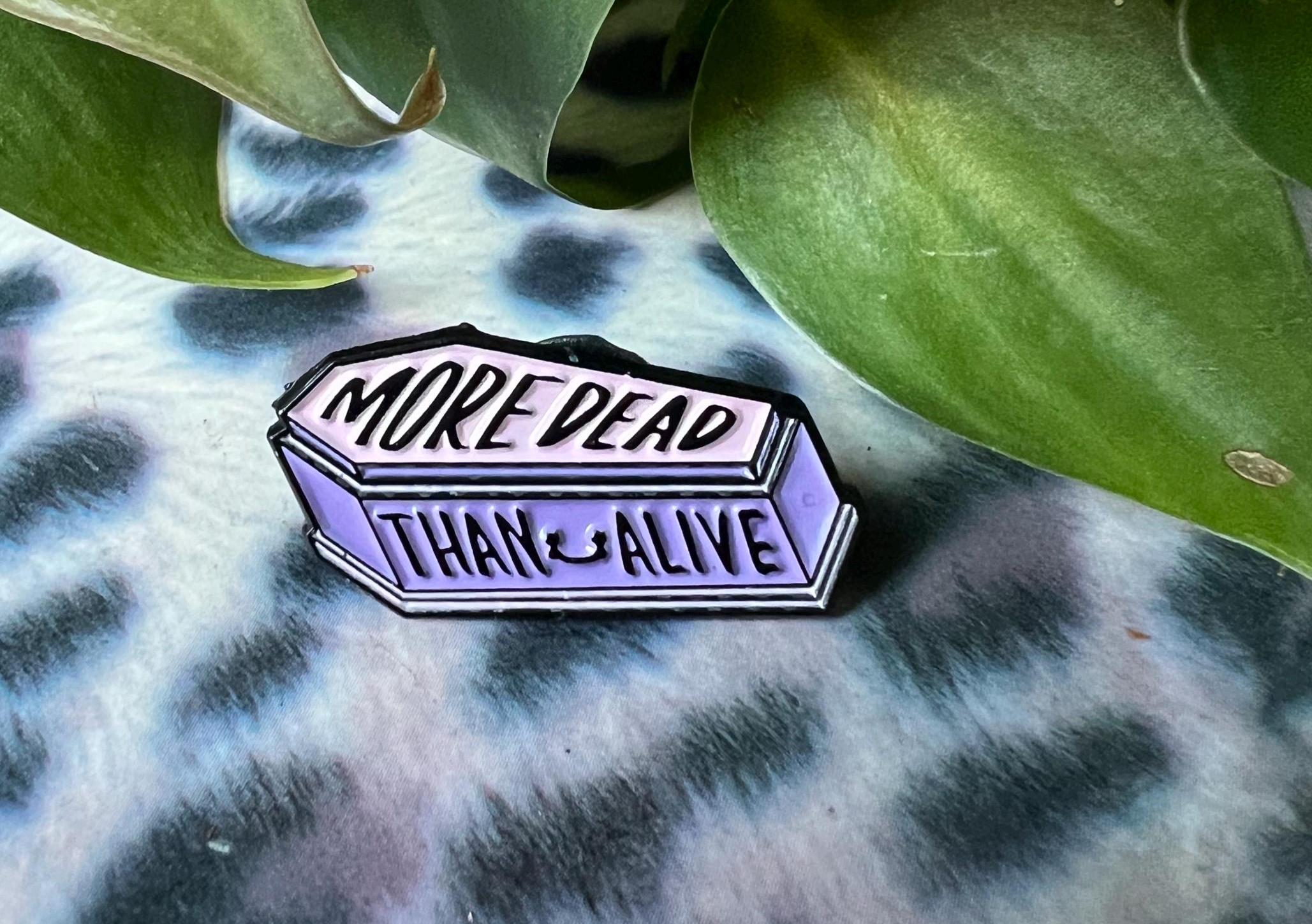 More Dead Than Alive coffin enamel pin