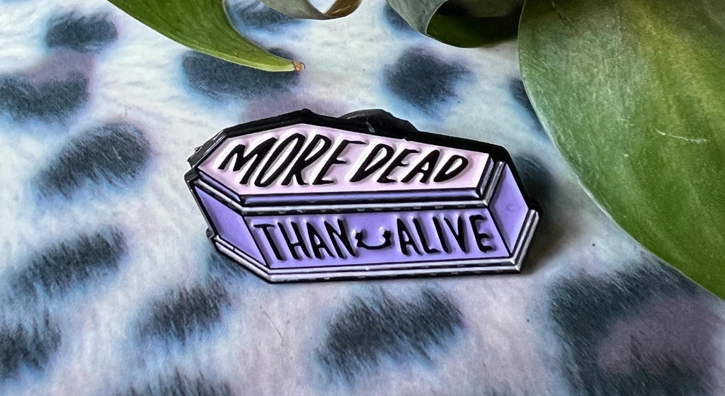 More Dead Than Alive coffin enamel pin