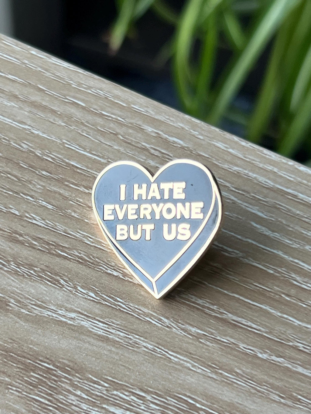 "I hate everyone but us" black heart enamel pin