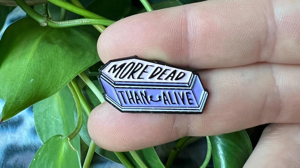 More Dead Than Alive coffin enamel pin