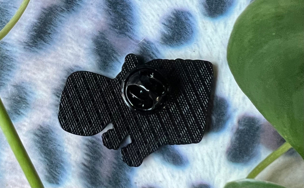 eat the rich screaming possum enamel pin