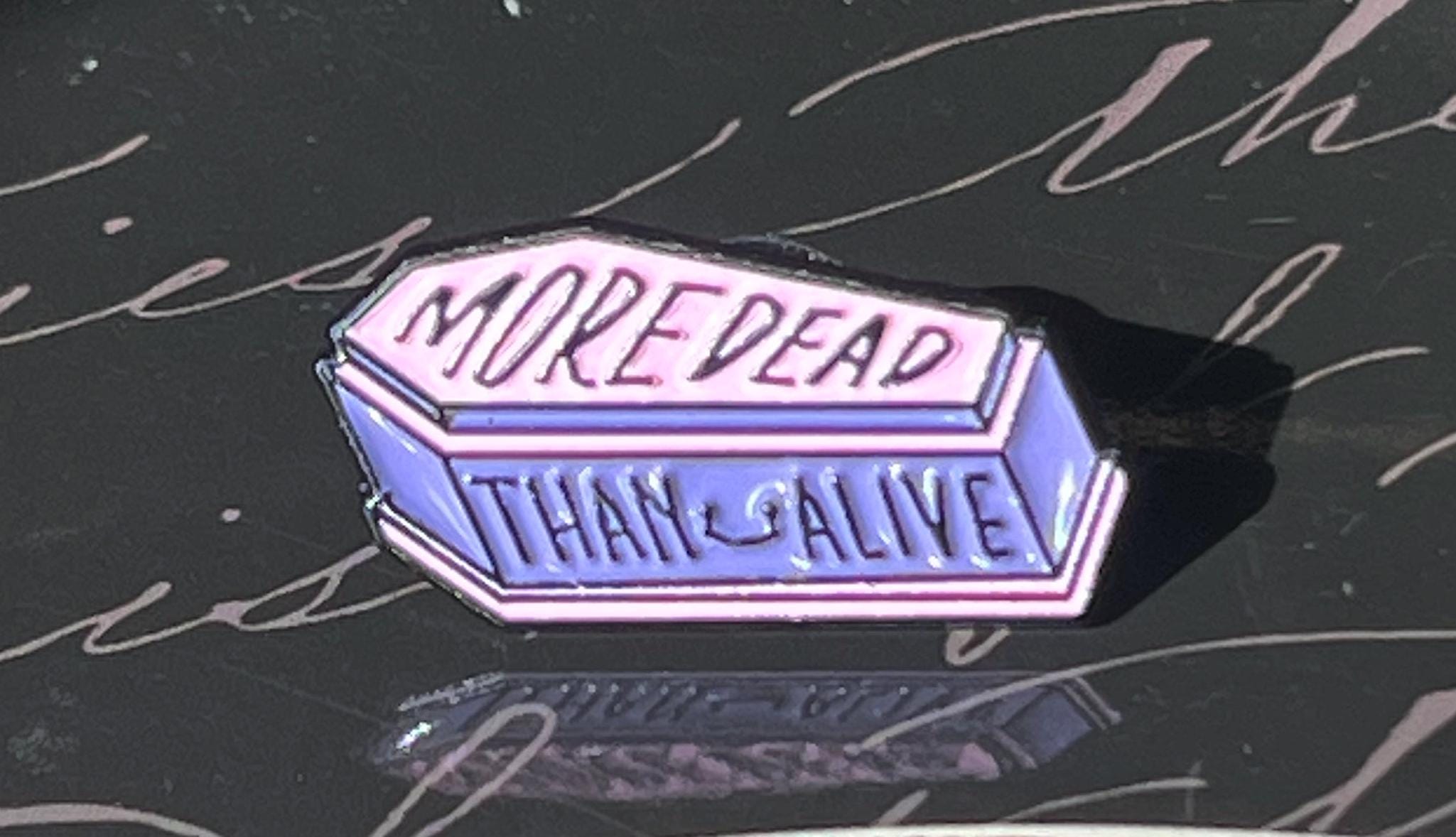 More Dead Than Alive coffin enamel pin